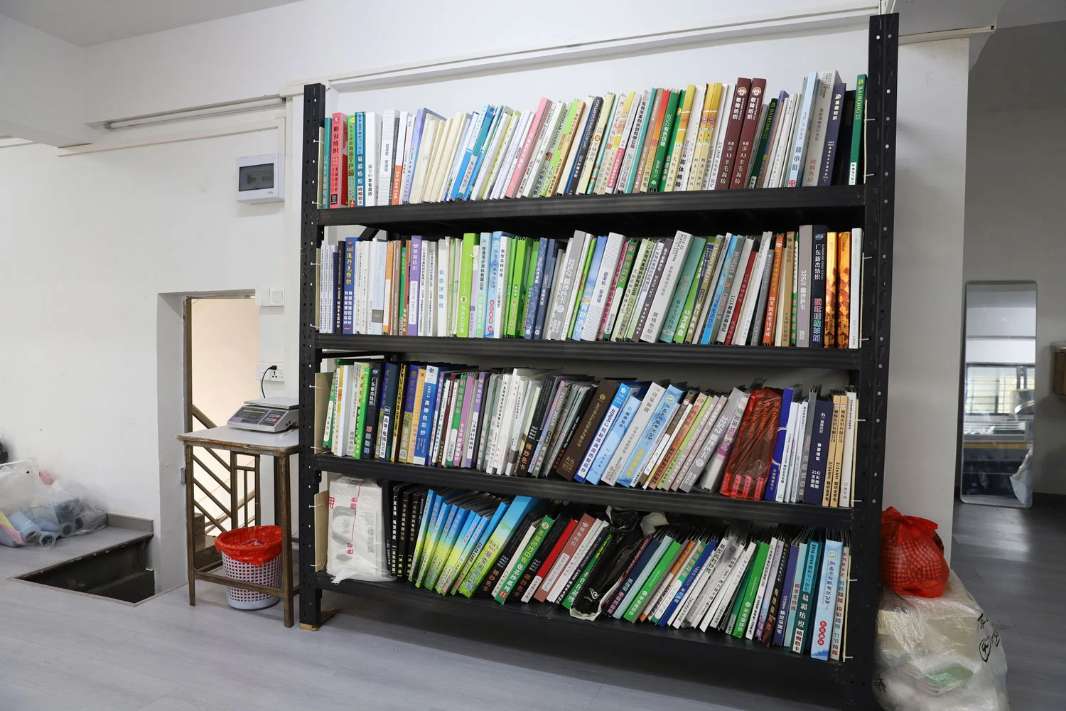 Yarn swatch book shelf reference library Strickwaren-Fabrik